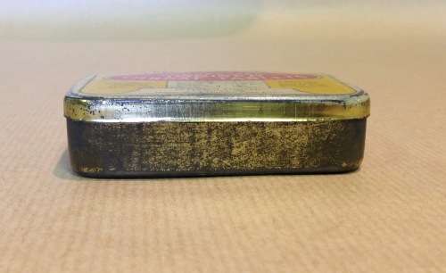 COMPRESSED IODISED THROAT TABLETS TIN RED LETTER BRAND PETERSEN LIMITED CAPE TOWN CHEMISTS.