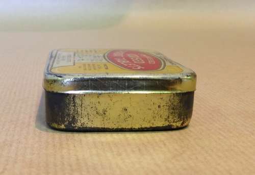 COMPRESSED IODISED THROAT TABLETS TIN RED LETTER BRAND PETERSEN LIMITED CAPE TOWN CHEMISTS.
