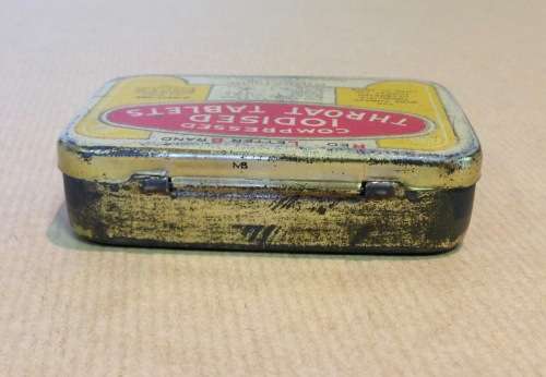 COMPRESSED IODISED THROAT TABLETS TIN RED LETTER BRAND PETERSEN LIMITED CAPE TOWN CHEMISTS.