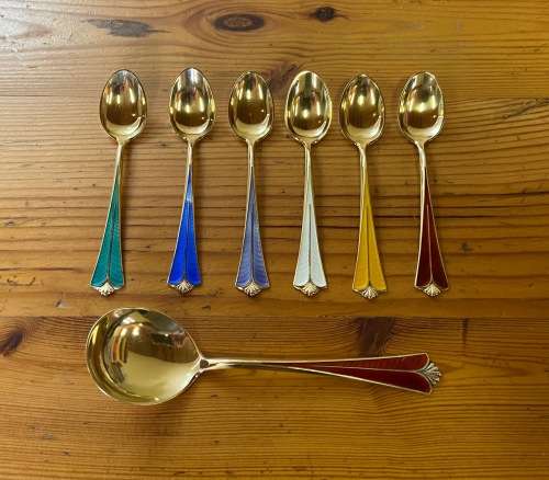 STERLING SILVER GILT & ENAMEL TEASPOONS x 6 SUGAR SPOON x 1 DAVID ANDERSEN NORWAY RADHUS PATTERN.