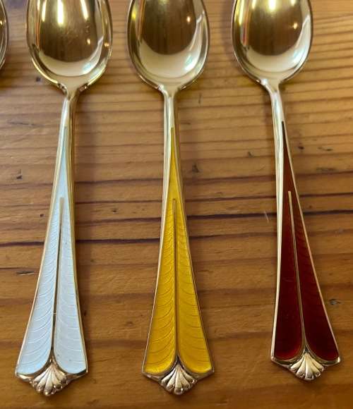 STERLING SILVER GILT & ENAMEL TEASPOONS x 6 SUGAR SPOON x 1 DAVID ANDERSEN NORWAY RADHUS PATTERN.
