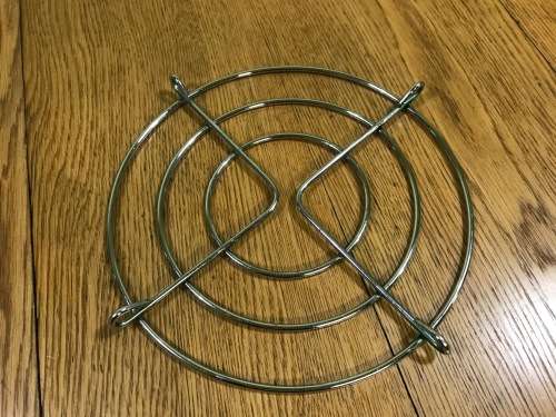 TRIVET  CHROME PLATED ROUND.
