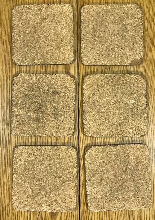 Set of 6 coasters with corked bases featuring famous artworks by various artists.