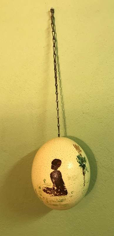 OSTRICH EGG PAINTED with a HANGING CHAIN.