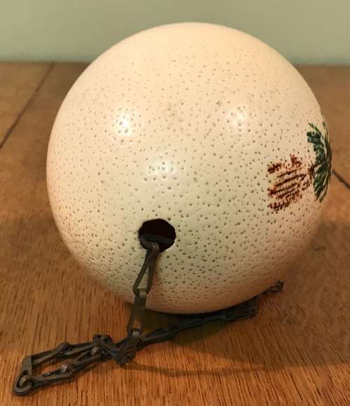 OSTRICH EGG PAINTED with a HANGING CHAIN.