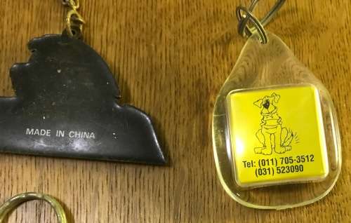 KEYRINGS x 7 - MIXED KEY RINGS AS SEEN - GUIDE DOGS - BOTTLE - MILLS - MONTU BUSCH GARDENS