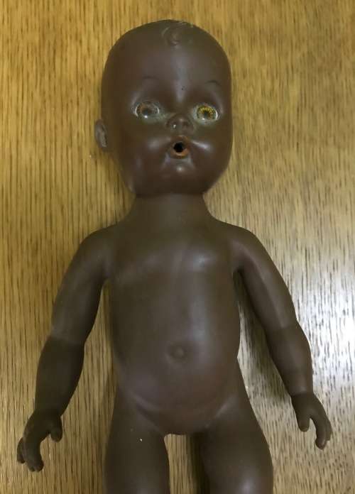 VINTAGE BLACK PLASTIC DOLL!!