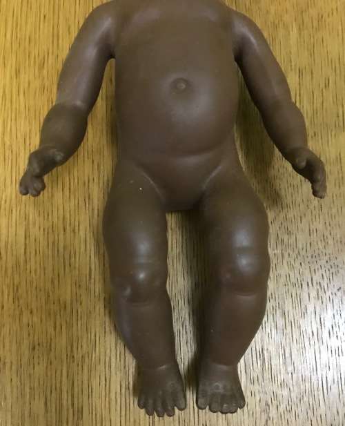 VINTAGE BLACK PLASTIC DOLL!!