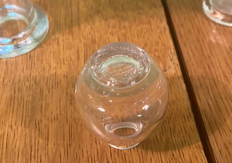 GLASS VASES / BOTTLES x 4 - possibly perfume bottles without stoppers.