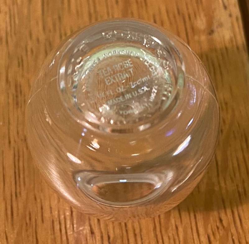 GLASS VASES / BOTTLES x 4 - possibly perfume bottles without stoppers.