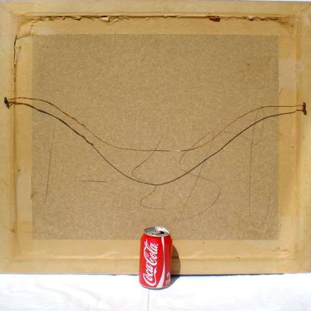 from behind and with a can of Coke