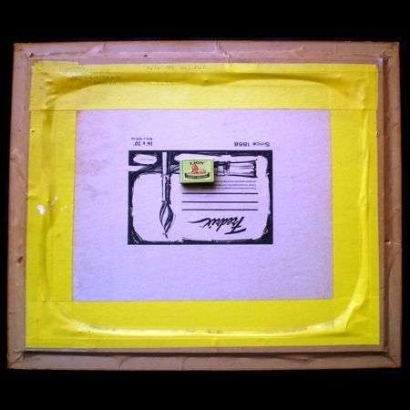 from behind and with a match box