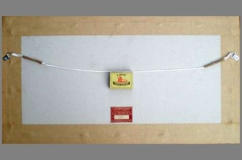 from behind and with a match box