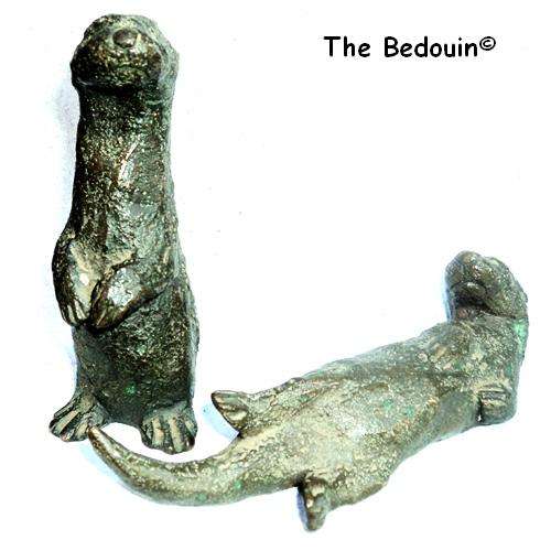 PAIR OF BRONZE OTTER FIGURINES. Signed 'Oman'. Limited casting no 15/30.