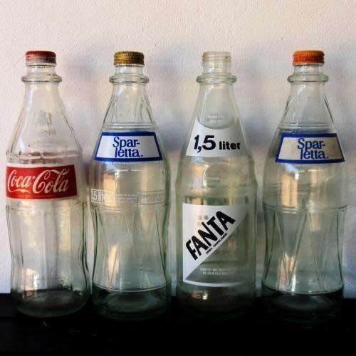Four Vintage COCA-COLA, FANTA & SPARLETTA returnable 1.5 litre glass bottles. South African.