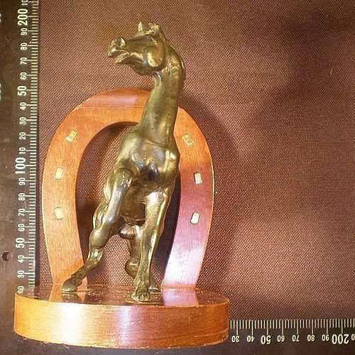 BOOKENDS. REARING HORSES. Spelter and Walnut wood.