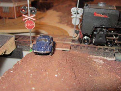 SAR HO scale level crossing with sensors.