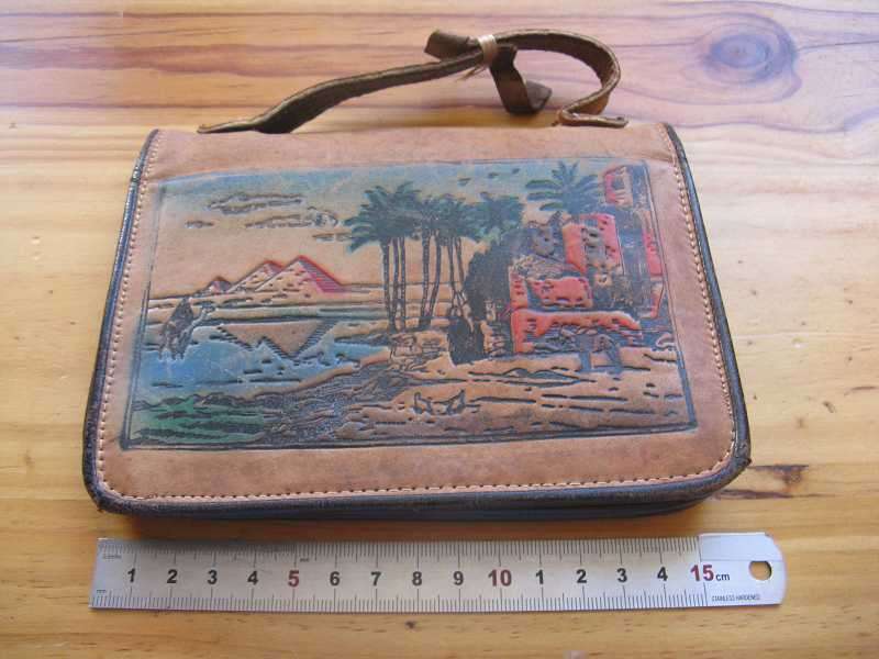 LEATHER SOUVENIR BAG EMBOSSED WITH ANCIENT EGYPTIAN SCENE'S. WEIGHT = 128g.