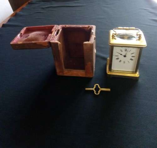 ANTIQUE FRENCH BRASS CARRIAGE CLOCK IN ORIGINAL CASE AND HAS ORIGINAL KEY