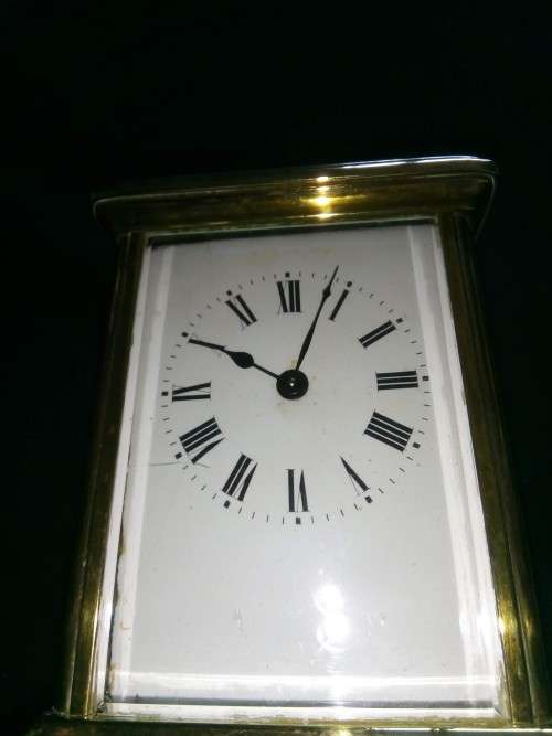 ANTIQUE FRENCH BRASS CARRIAGE CLOCK IN ORIGINAL CASE AND HAS ORIGINAL KEY
