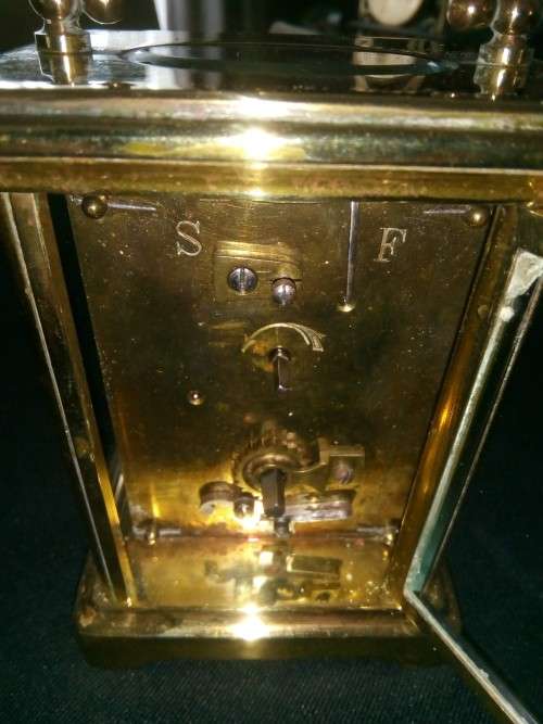 ANTIQUE FRENCH BRASS CARRIAGE CLOCK IN ORIGINAL CASE AND HAS ORIGINAL KEY