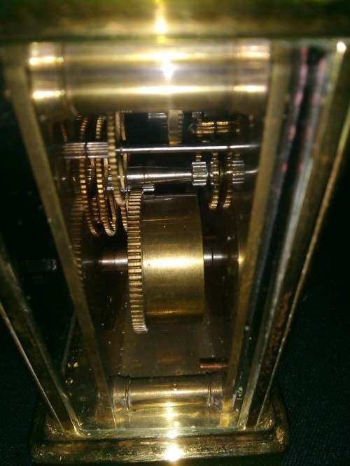 ANTIQUE FRENCH BRASS CARRIAGE CLOCK IN ORIGINAL CASE AND HAS ORIGINAL KEY