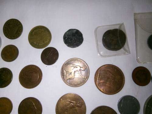 COINS - 52 ASSORTED INTERNATIONAL COINS - ALL GRADES