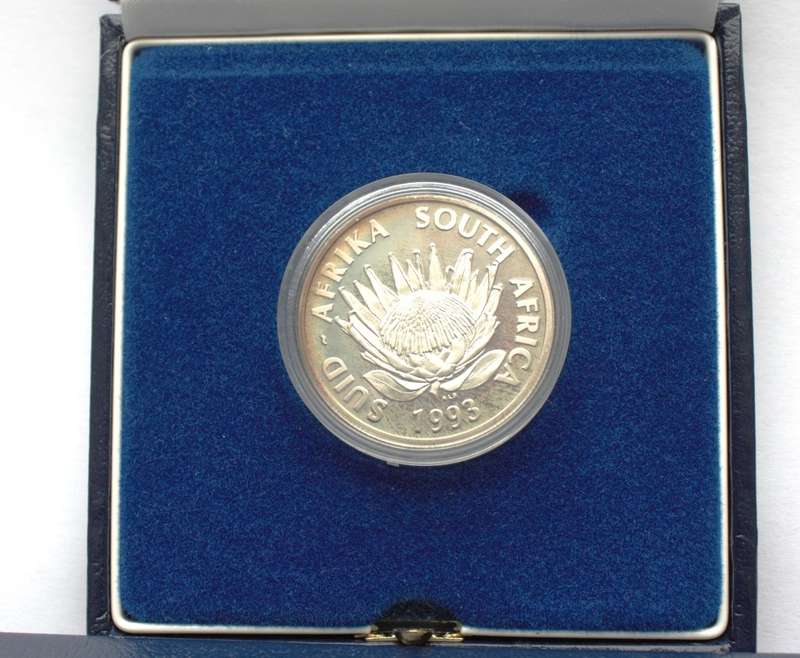 1993 Silver Protea One Rand. Proof - Banking - Mintage 7,584 - Issued in Blue SAM Case and sealed.