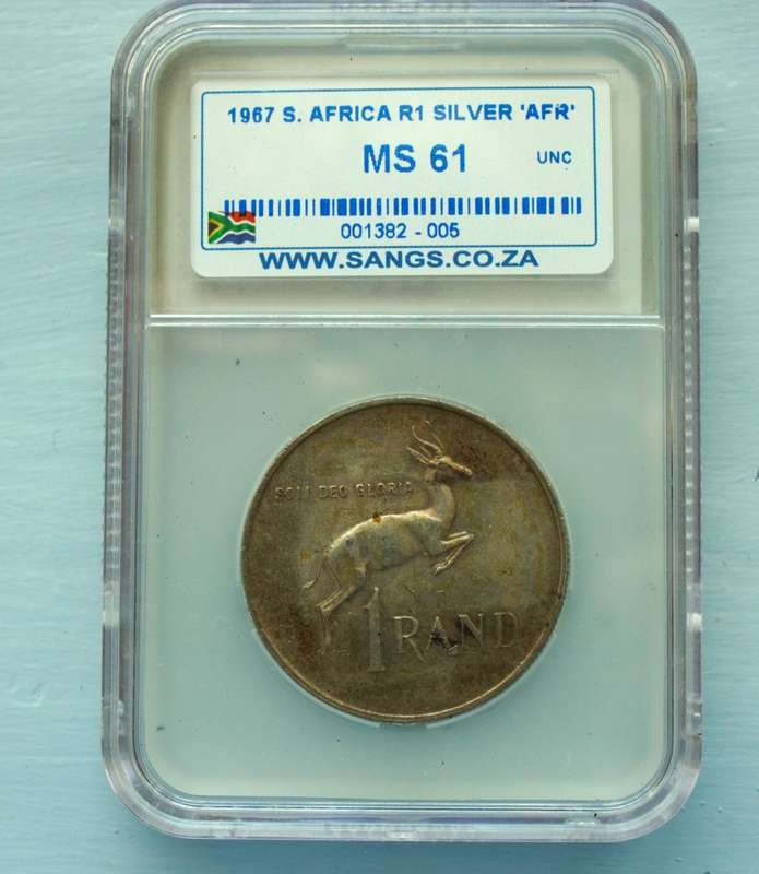 1967 SILVER PROTEA ONE RAND. GRADED MS 61. AFRIKAANS.