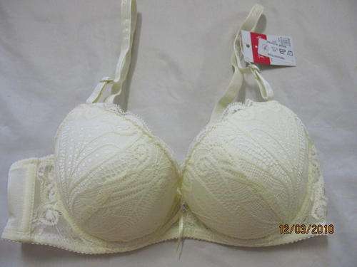 Triumph  --   Light  yellow flower bra size 34B