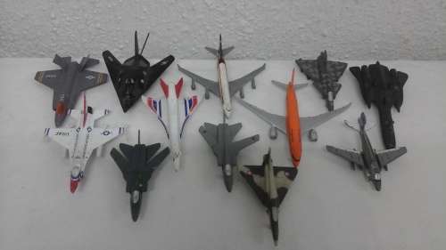 TWELVE FANTASTIC DIE-CAST AIRCRAFT MODELS. MADE IN CHINA. WELL DETAILED, MINI REPLICAS. AWESOME!