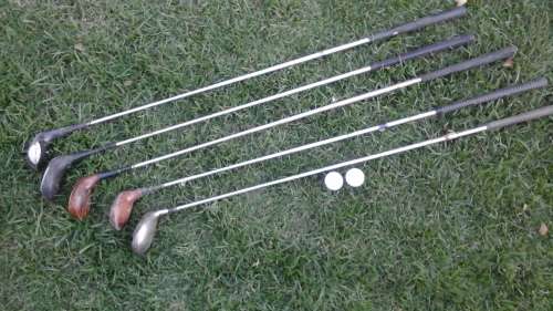 AN ASSORTMENT OF FIVE DIFFERENT AWESOME VINTAGE GOLF CLUBS. FANTASTIC!