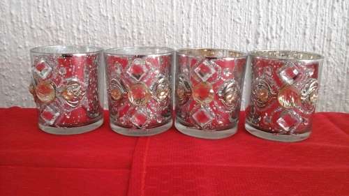 4 MAGNIFICENT GLISTENING BEAUTIFUL CANDLE HOLDERS