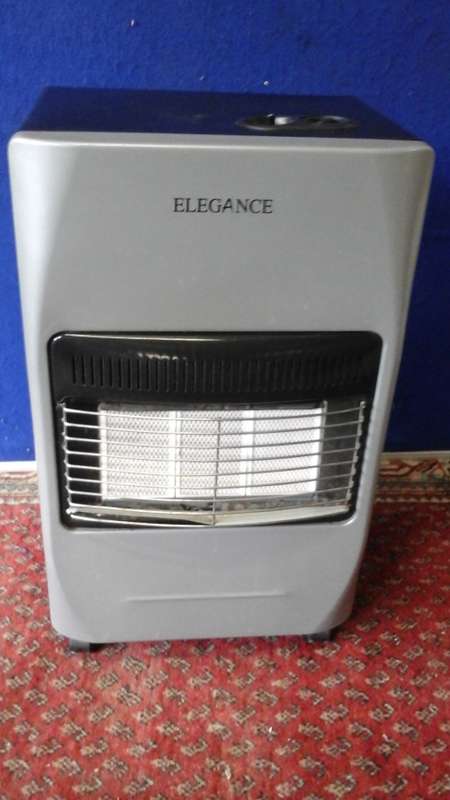 JUST IN TIME FOR THE COLD SPELL AN ELEGANCE GAS HEATER