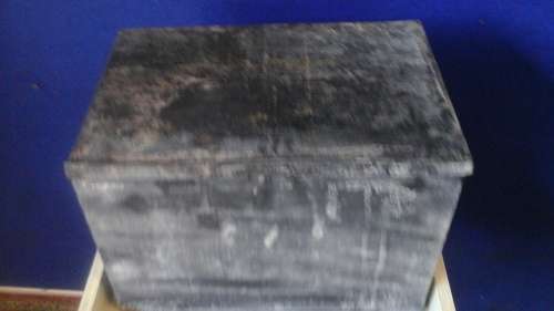 A VINTAGE STEEL TRUNK. RUSTED WITH AGE GIVES IT AN AMAZING PATINA