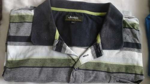 AS GOOD AS NEW 3XL JEEP T SHIRT.