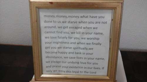 SOMETHING DIFFERENT A STORY ON MONEY IN A MAGNIFICENT GOLD FRAME. UNUSUAL