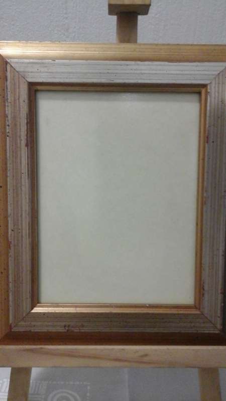 THE PEFECT TWO TONED ORNATE FRAME.  PERFECT FOR THE ANNUAL FAMILY PHOTGRAPH