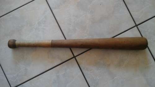 STRONG AND STURDY ROUGH AND READY EITHER WAY THIS VINTAGE BASEBALL BAT IS STILL SPECTACULAR