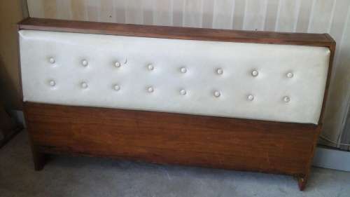 STRAIGHT FROM THE SEVENTIES A DOUBLE HEADBOARD WITH FAUX LEATHER THAT OPENS FOR STORAGE. WOW