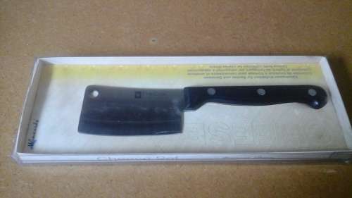 NICE AND SHARP AND STILL IN ITS BOX A FANTASTIC CHEESE CLEAVER/KNIFE. WOW