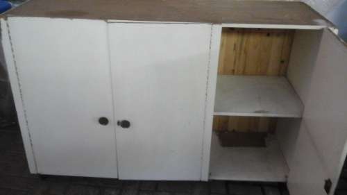 NEW YEARS RESOLUTION TO CLEAN OUT THE GARAGE.THIS VINTAGE WOODEN CUPBOARD WILL WORK WELL TO PACK IN