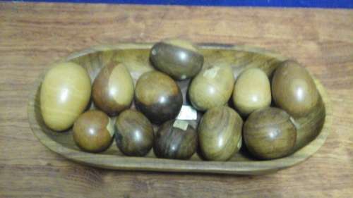 ABSOLUTELY TERRIFIC VINTAGE HAND CRAFTED KIAAT BOWL AND AND ASSORTMENT OF 12 WOODEN EGGS. AWESOME!