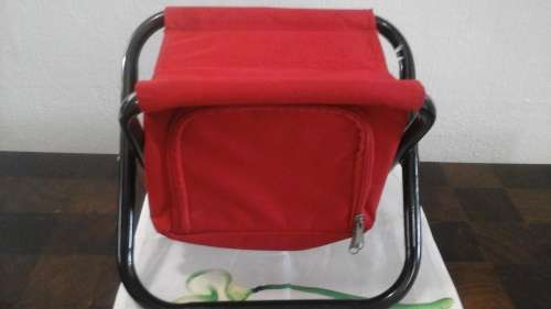 FANTASTIC AND DIFFERENT. AN ADORABLE KIDDIES FOLD UP CHAIR THAT DOUBLES AS A COOLER BAG!