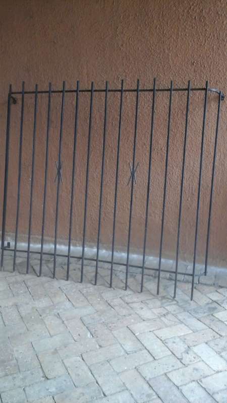 KEEP YOUR HOME SECURE. FANTASTIC SPANISH STYLE BURGLAR BAR. GIVE YOU SLIGHT MORE PEACE OF MIND!