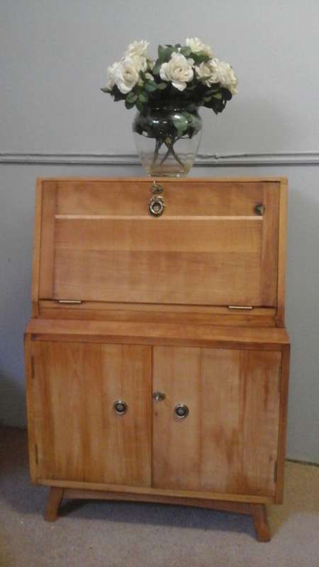 A VINTAGE MCNAMEE OF DURBAN WRITING BUREAU. IT HAS PLACE FOR STAMPS& DOORS ARE REINFORCED APPROX50'S