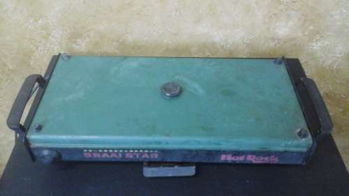 FANTASTIC JUST WHAT YOU NEED. A BRAAI STAR HOT ROCK BRAAI.VERY USEFUL BRAAI ON THE PATIO IF IT RAINS