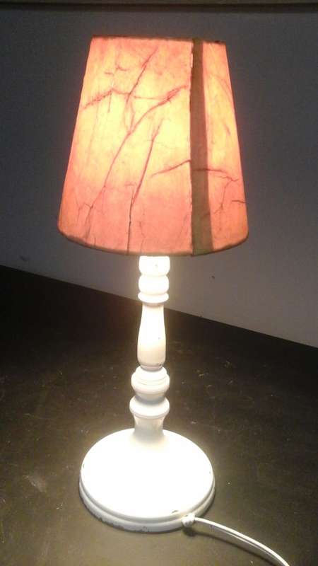A MAGNIFICENT VINTAGE STEEL LAMP. HAS A LOVELY SHABBY SCHICK LOOK ABOUT IT.