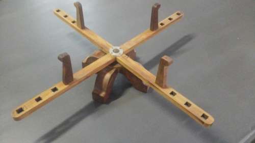 WOW WHAT A RARE FIND!!!!! A VINTAGE WINDER THAT IS SIZE ADJUSTABLE. JUST MOVE THE PEGS