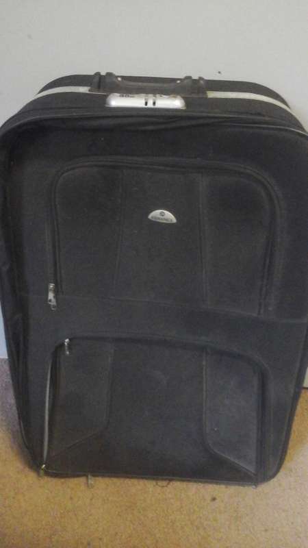 FANTASTIC KIKA ADVANCED TRAVEL BAG.  IT IS BLACK AND GREY IN COLOR. TATTY BUT TERRIFIC FOR STORAGE!
